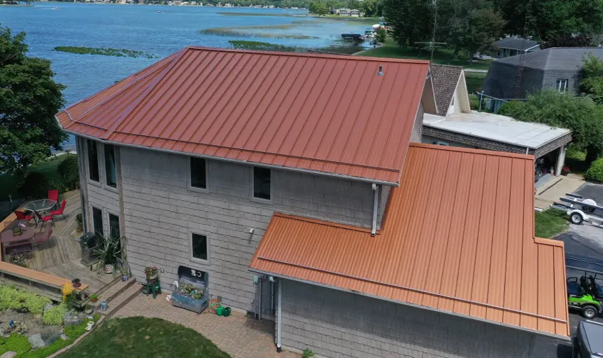 Tarping and dry-in on a Williamsburg in the Woods commercial roof